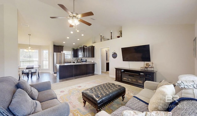 11116 Sturbridge Loop, Daphne, AL 36526 - living area with ceiling fan, a chandelier, baseboards, recessed lighting, and high vaulted ceiling