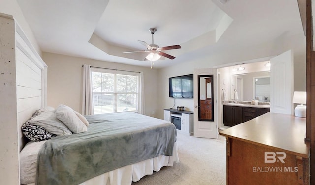 11116 Sturbridge Loop, Daphne, AL 36526 - bedroom with a raised ceiling, light colored carpet, ensuite bathroom, and a ceiling fan