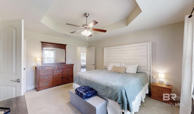 11116 Sturbridge Loop, Daphne, AL 36526 - bedroom with a raised ceiling, light colored carpet, and a ceiling fan