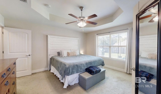 11116 Sturbridge Loop, Daphne, AL 36526 - bedroom with light colored carpet, baseboards, and a raised ceiling