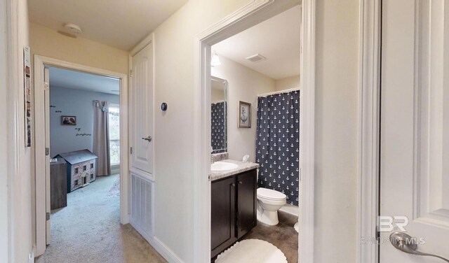 11116 Sturbridge Loop, Daphne, AL 36526 - full bathroom featuring toilet, vanity, and a shower with curtain