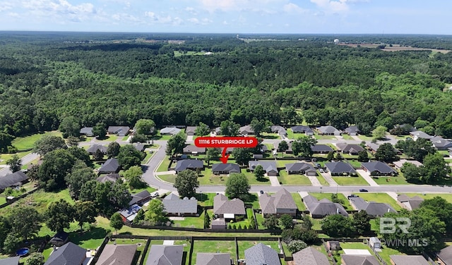 11116 Sturbridge Loop, Daphne, AL 36526 - aerial view of property and surrounding area with a forest and nearby suburban area