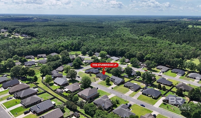 11116 Sturbridge Loop, Daphne, AL 36526 - aerial view of property's location with a forest and nearby suburban area