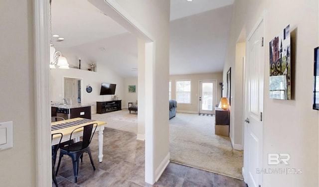 11116 Sturbridge Loop, Daphne, AL 36526 - hall featuring vaulted ceiling, a sink, carpet floors, and baseboards