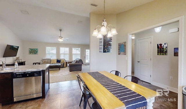 11116 Sturbridge Loop, Daphne, AL 36526 - dining space featuring lofted ceiling, a ceiling fan, a chandelier, and baseboards