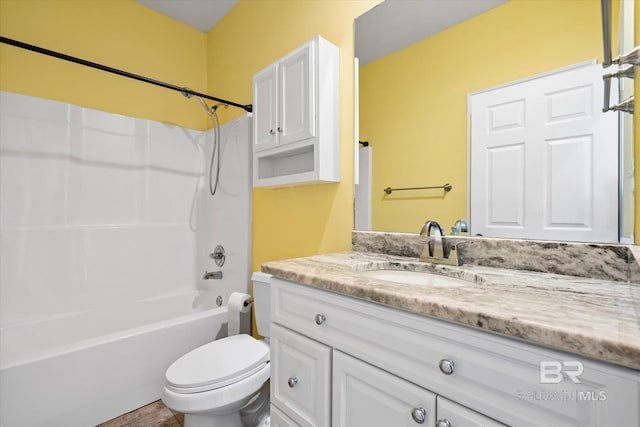 full bathroom featuring shower / bath combination, toilet, and vanity