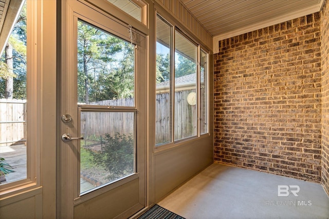 unfurnished sunroom featuring plenty of natural light