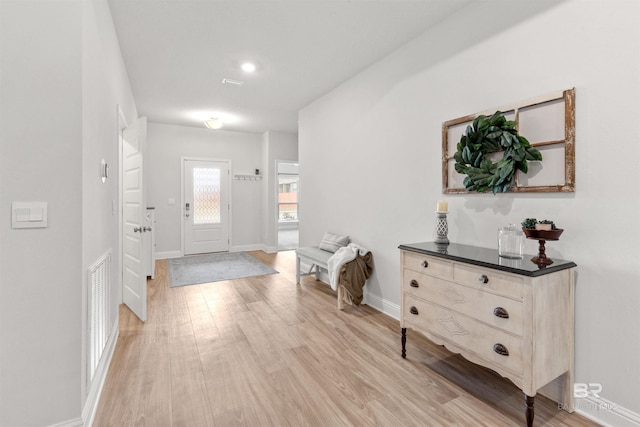 foyer entrance featuring light wood-type flooring