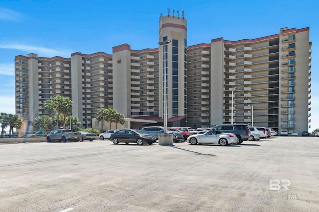 view of property with uncovered parking