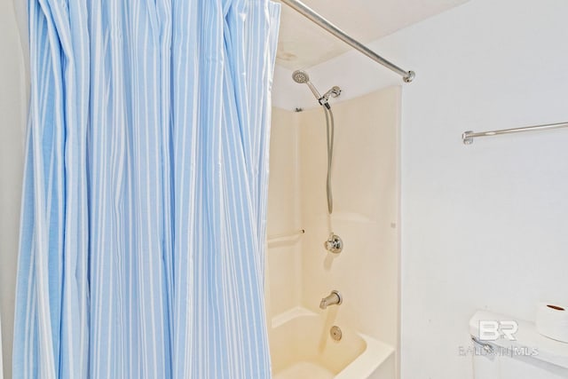 24400 Perdido Beach Blvd Unit 501, Orange Beach, AL 36561 - bathroom featuring shower / bathtub combination with curtain and toilet