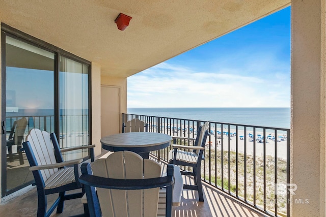 24400 Perdido Beach Blvd Unit 501, Orange Beach, AL 36561 - balcony featuring a water view and a beach view