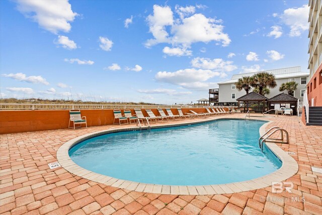 view of pool with a gazebo