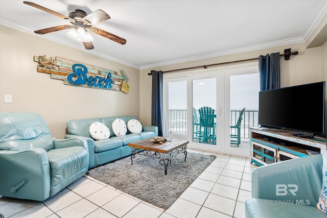 tiled living room with ceiling fan and ornamental molding