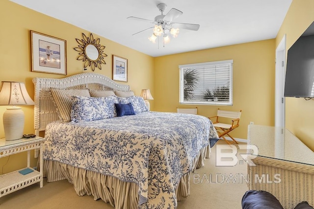 carpeted bedroom with ceiling fan