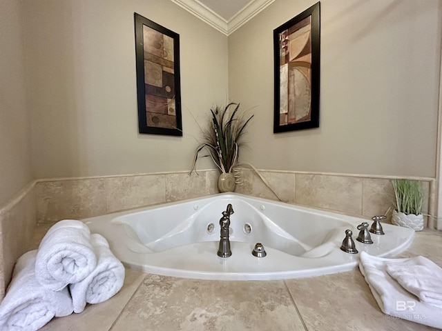 bathroom featuring a tub to relax in and crown molding