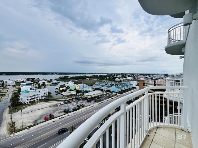 balcony featuring a water view