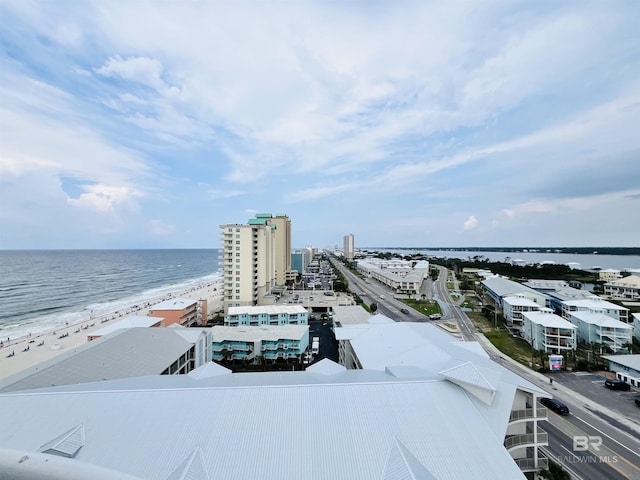 drone / aerial view with a water view and a view of the beach