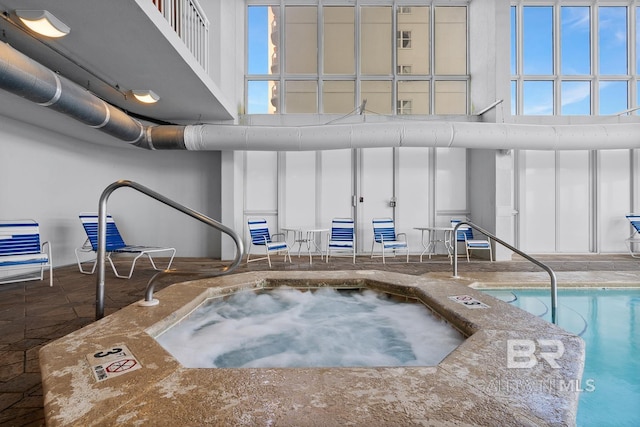 825 W Beach Blvd Unit 9, Gulf Shores, AL 36542 - view of pool with an in-ground hot tub