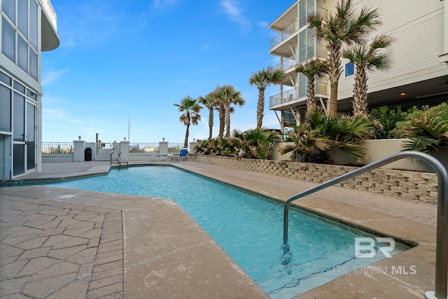 825 W Beach Blvd Unit 9, Gulf Shores, AL 36542 - community pool featuring a patio area