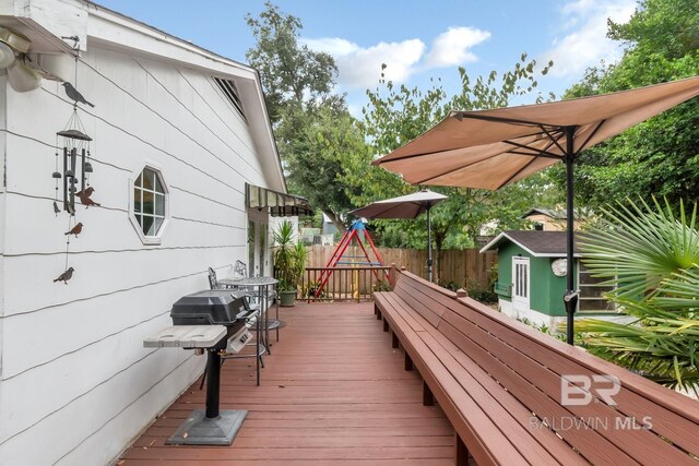 deck featuring a shed