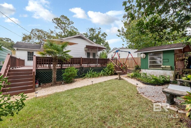 view of yard featuring a deck