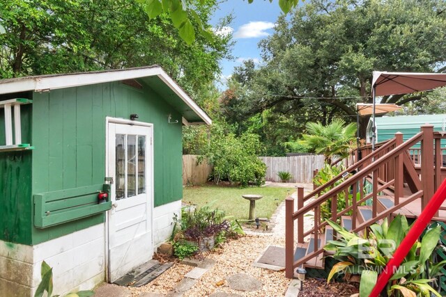 view of outdoor structure featuring a yard