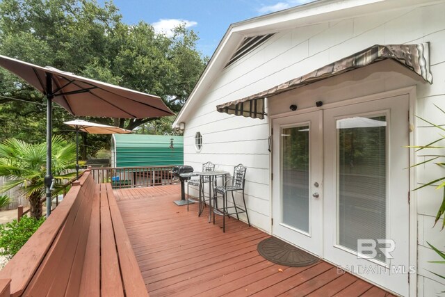 wooden deck with french doors