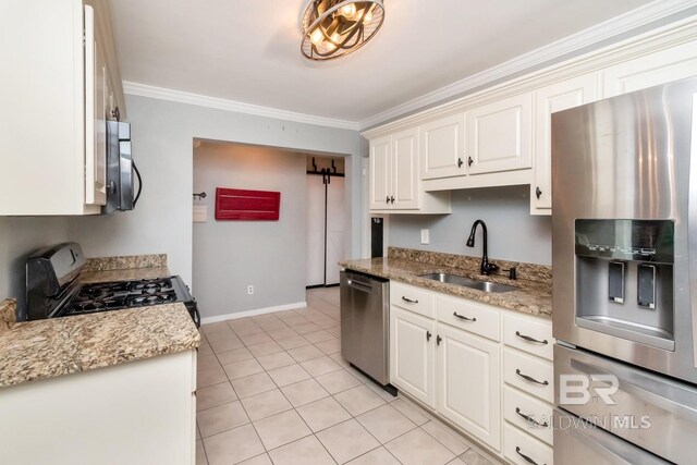 kitchen featuring ornamental molding, stainless steel appliances, light stone counters, sink, and light tile patterned flooring