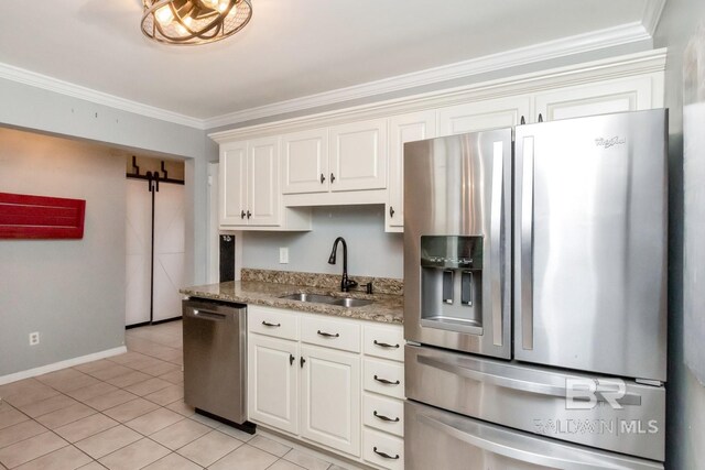 kitchen with light stone counters, stainless steel appliances, sink, light tile patterned flooring, and ornamental molding