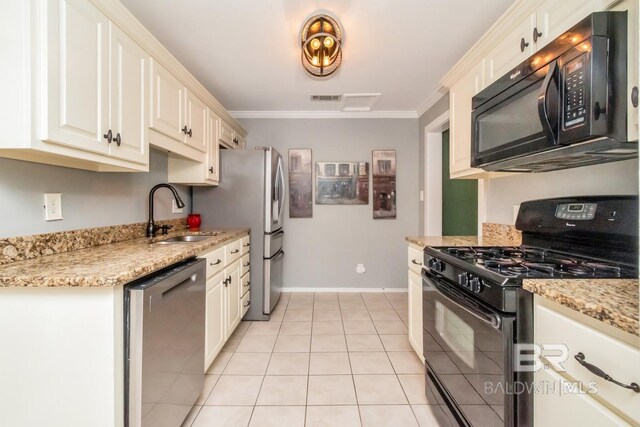 kitchen featuring black appliances, light stone countertops, ornamental molding, and sink