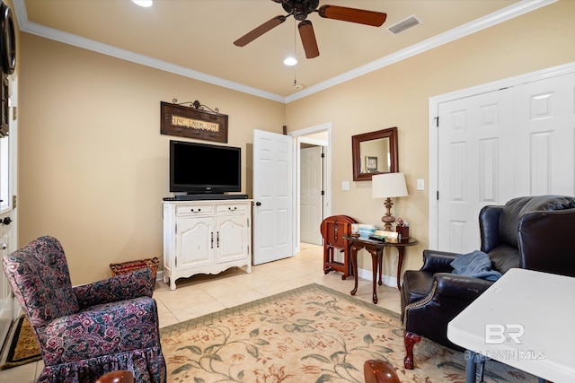 tiled living room featuring ceiling fan and ornamental molding