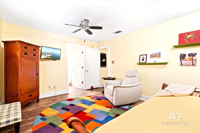 interior space featuring hardwood / wood-style floors and ceiling fan