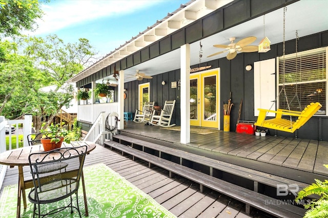 wooden deck with ceiling fan