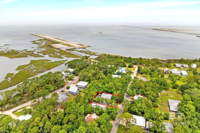 drone / aerial view with a water view