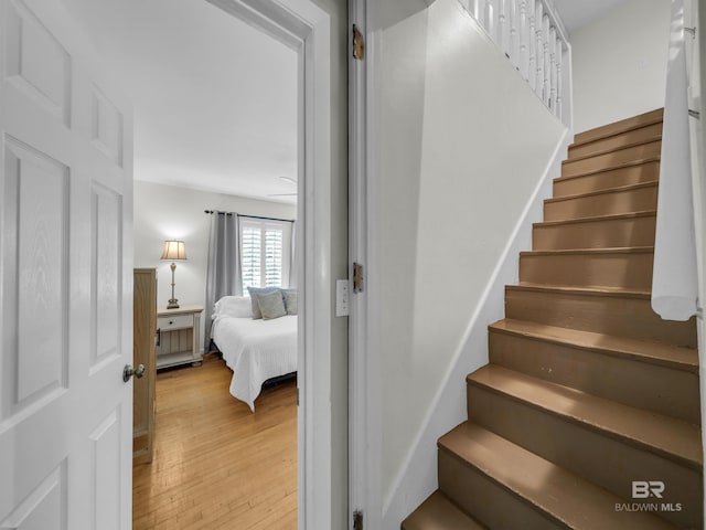 5410 Florida Ave, Orange Beach, AL 36561 - stairs with wood finished floors