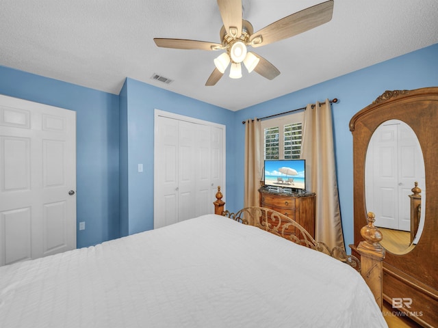 5410 Florida Ave, Orange Beach, AL 36561 - bedroom featuring visible vents, a closet, and a ceiling fan