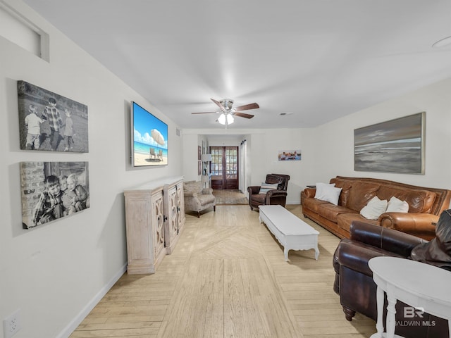 5410 Florida Ave, Orange Beach, AL 36561 - living area featuring baseboards, light wood-style floors, and a ceiling fan