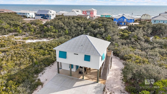 aerial view with a water view and a residential view