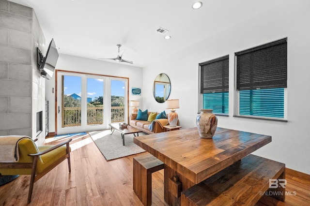 dining room with a ceiling fan, light wood-type flooring, visible vents, and recessed lighting