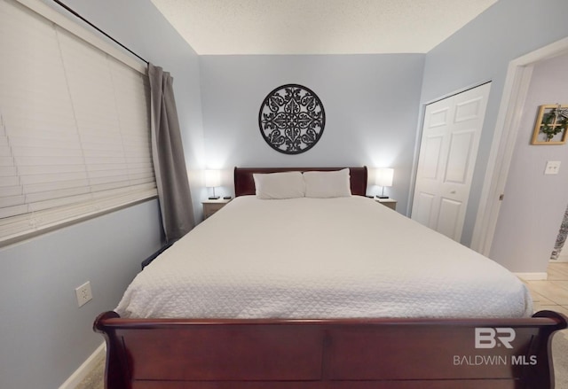 bedroom with baseboards