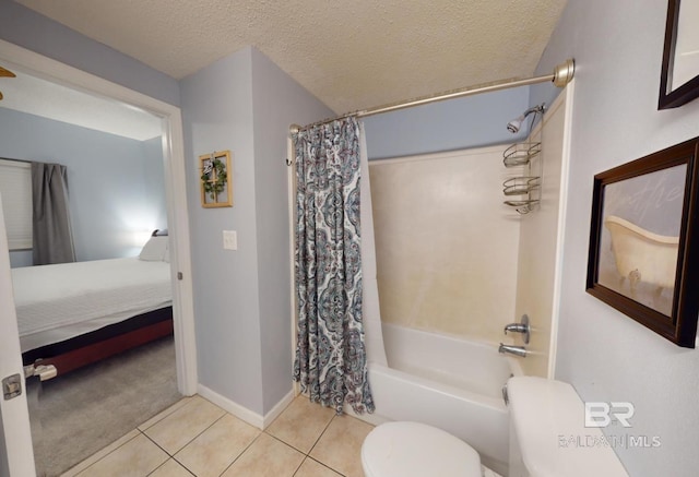 ensuite bathroom featuring shower / bathtub combination with curtain, tile patterned flooring, ensuite bathroom, a textured ceiling, and toilet