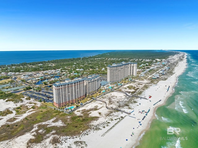 bird's eye view featuring a city view, a beach view, and a water view