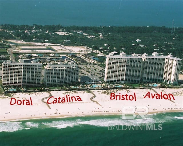 property's view of city featuring a beach view