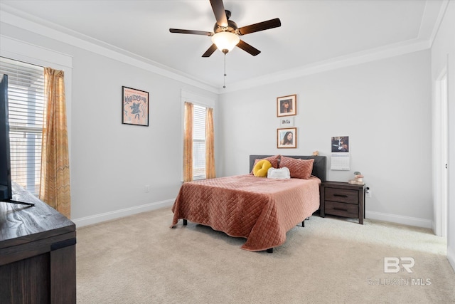 bedroom with multiple windows, crown molding, light colored carpet, and ceiling fan