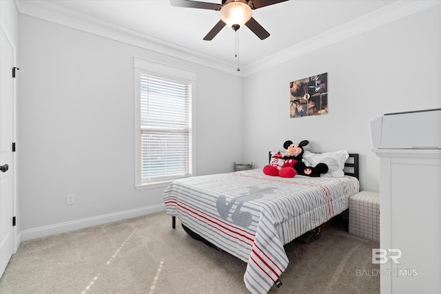 bedroom featuring multiple windows, crown molding, carpet floors, and ceiling fan