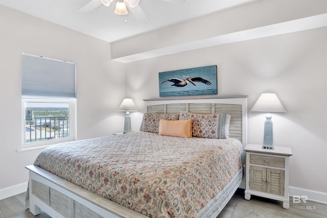 bedroom featuring ceiling fan and light hardwood / wood-style floors