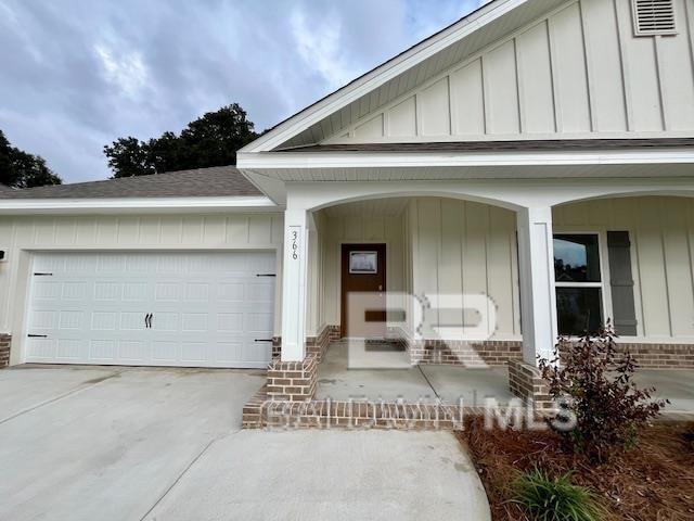 property entrance featuring a garage