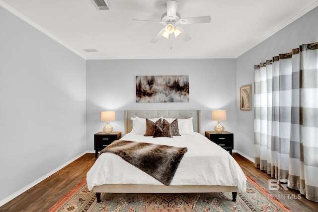 bedroom featuring ceiling fan, crown molding, and dark hardwood / wood-style flooring