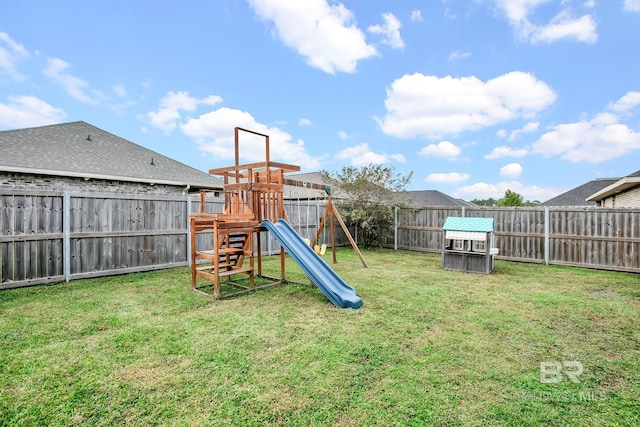 view of jungle gym with a lawn