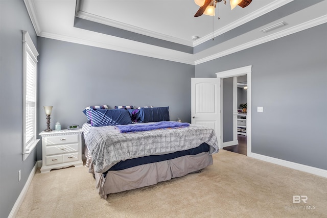 bedroom featuring light carpet, baseboards, visible vents, and ornamental molding